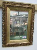 Gilt ornately framed wall mirror, 67 x 50cms. Estimate £20-30