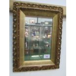 Gilt ornately framed wall mirror, 67 x 50cms. Estimate £20-30