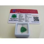 Trillion cut green emerald, weight 6.90ct with certificate. Est £40-50