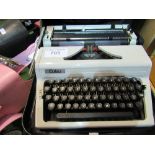 Erika portable typewriter in case. Estimate £10-20