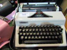 Erika portable typewriter in case. Estimate £10-20