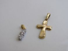 18ct gold and diamond pendant weight 1.6gms, 18ct gold pendant in the shape of a cross weight 3.