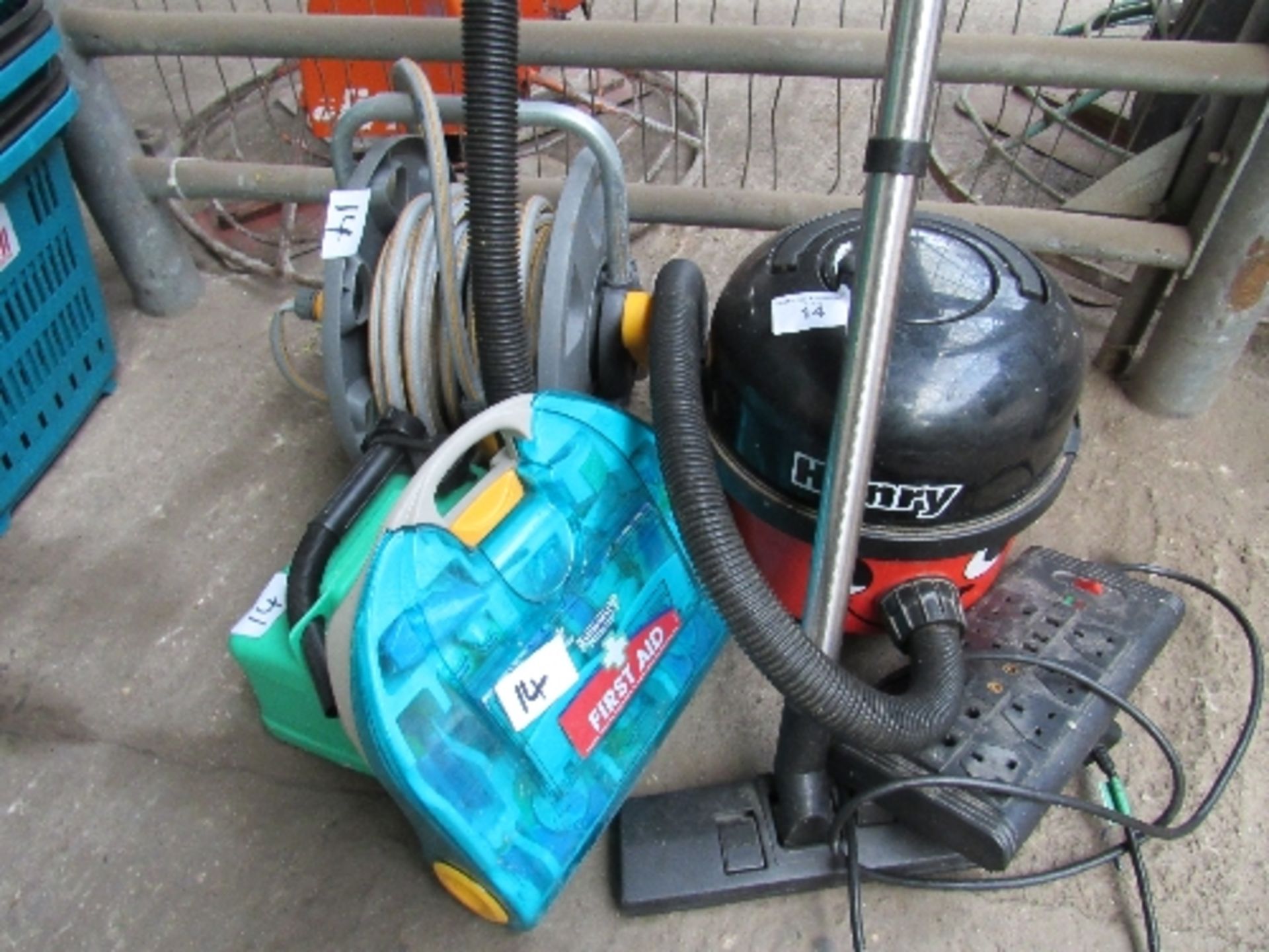 Henry vacuum cleaner, hose reel with hose, plug extension lead & a first aid kit