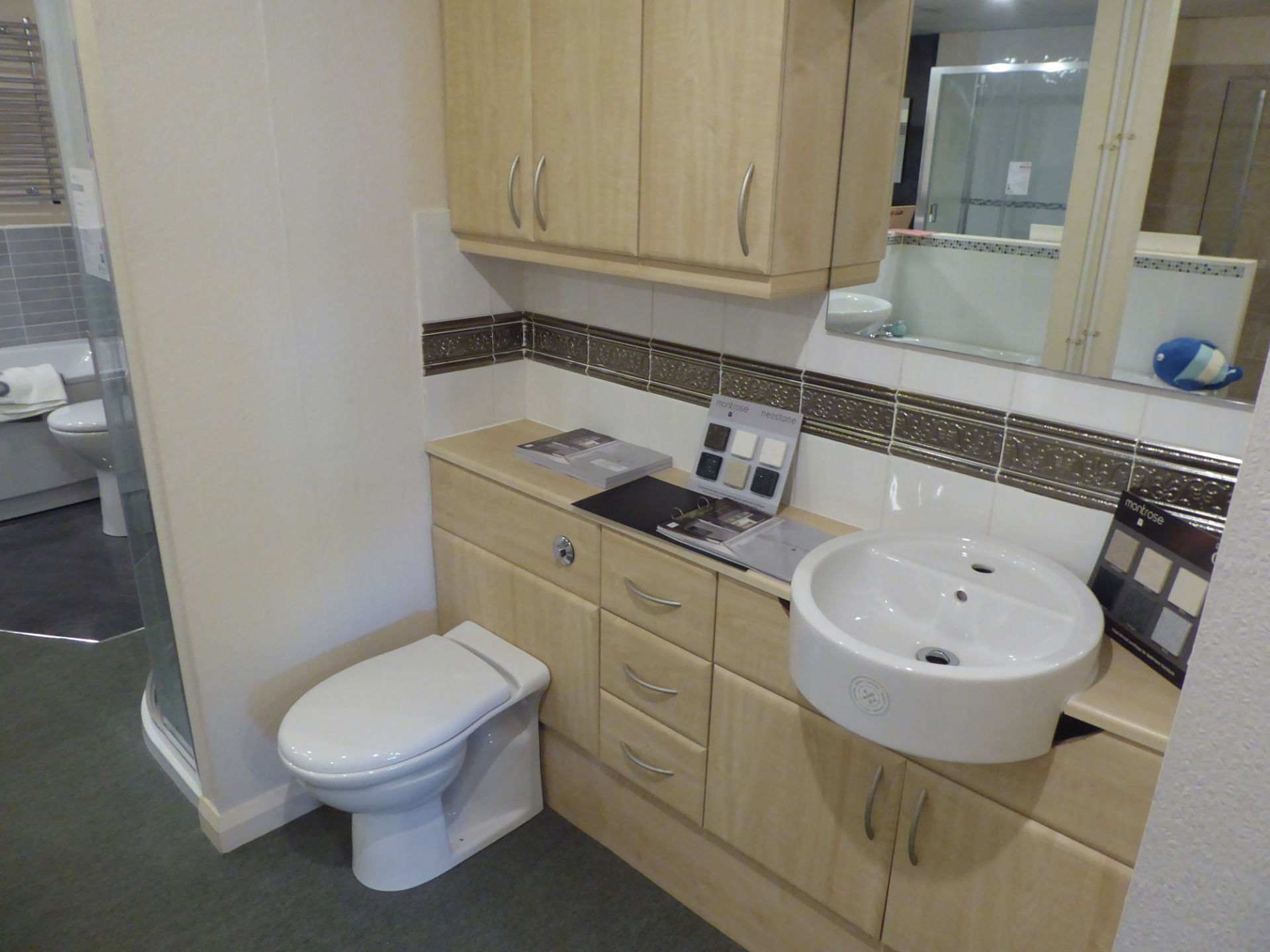 Semi counter top cloakroom in maple with ideal standard white basin and alto w.c