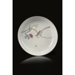 A Famille Rose ruby-back dish decorated with a bird perched on flowering branchChina, 20th century(