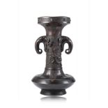 A bronze vase of archaistic form with twin elephant handles and a chilong applied to the neck (