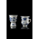 A blue and white porcelain cup and bowl decorated with figures (slight defects)China, Qing