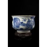 A blue and white large bowl decorated with mythical creatures (slight defects)China, 19th century(d.