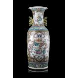 A twin-handled Famille Rose vase decorated with figures (restorations)China, 19th century(h. 62