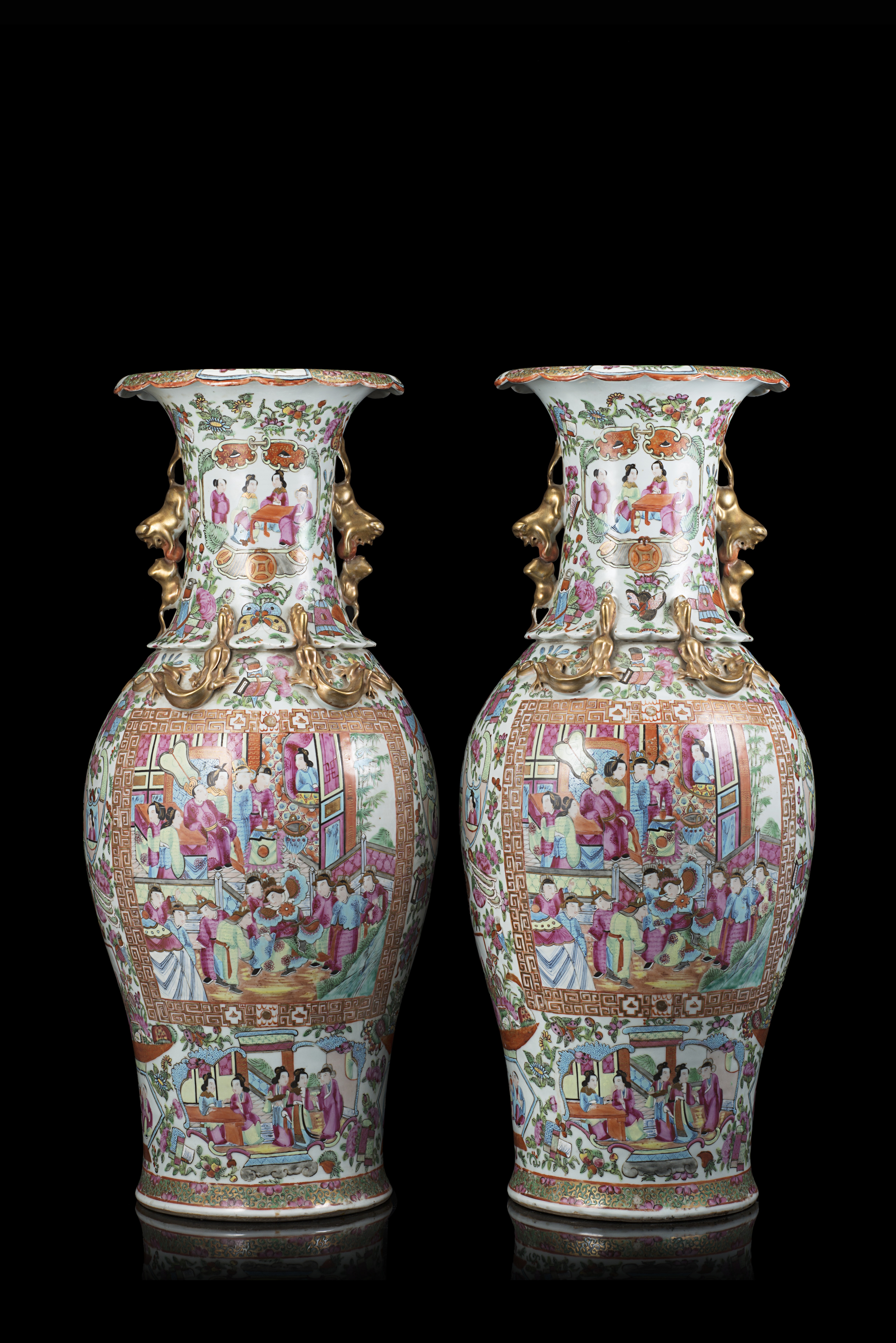 A pair of Cantonese Famille Rose vases decorated with figures in interior scenes and floral - Image 3 of 3