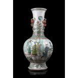 A Famille Verte vase with twin handles shaped as fruits, decorated with figures (defects)China, 20th