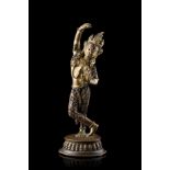 A gilt bronze figure of a dancing TaraChina, 20th century(h. 20.5 cm.)ITTara danzante in bronzo