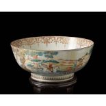 A Chinese export porcelain Famille Rose bowl decorated with a hunting scene wood base (defects and