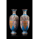 A pair of cloisonnÃ¨ enamel vases decorated with archaistic and geometric motifs (slight defects)