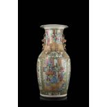 A Cantonese Famille Rose vase decorated with figures in interior scenes (slight defects)China,