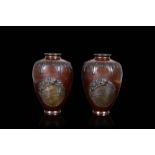 A pair of bronze vases decorated with applied boys (slight defects)Japan, Meiji period (1868-1912)(