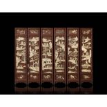 A six fold cinnabar lacquer screen with applied carved ivory elements depictings the Daoist