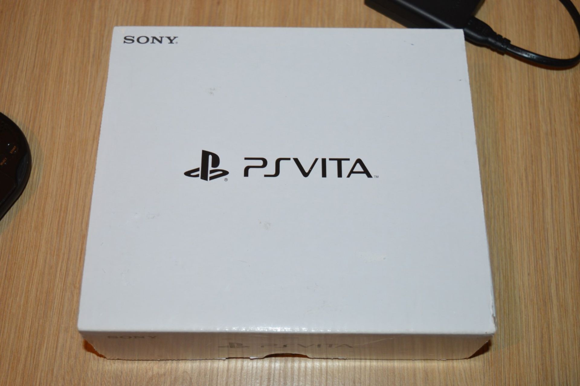 1 x Sony PS Vita Handheld Playstation Games Console - Boxed With Charger and Game - In Good - Image 4 of 4