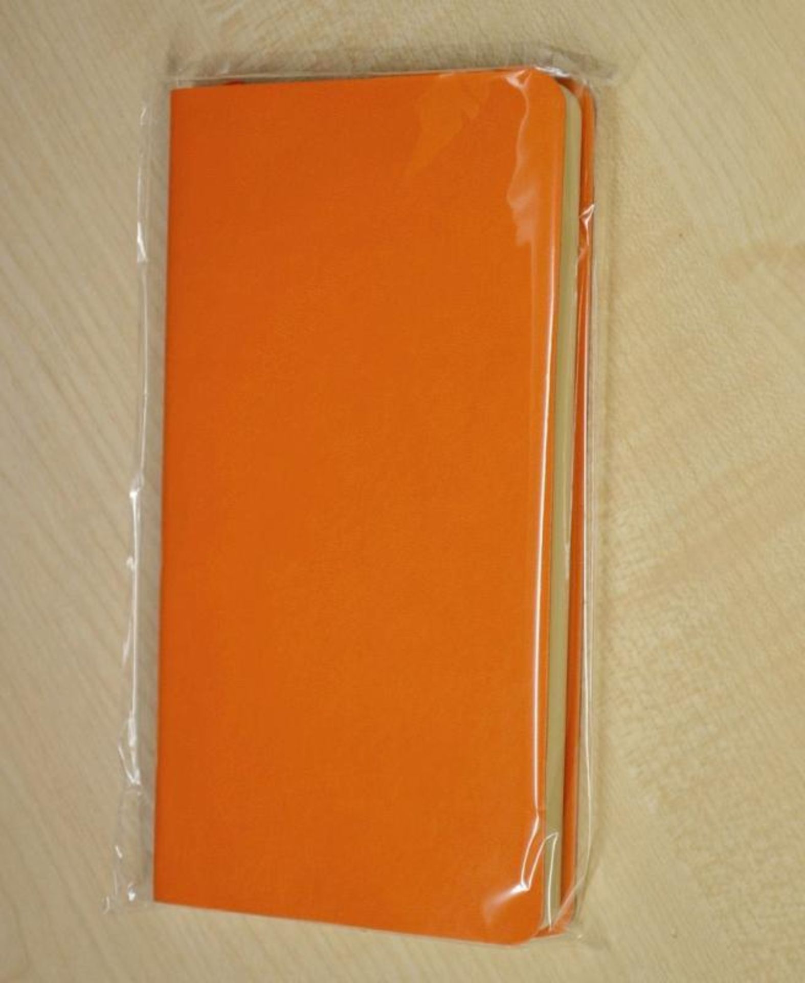25 x ICE LONDON "Slim" Faux Leather Covered Notebooks In Bright Orange - Dimensions: 17.7 x 10cm - B - Image 2 of 3