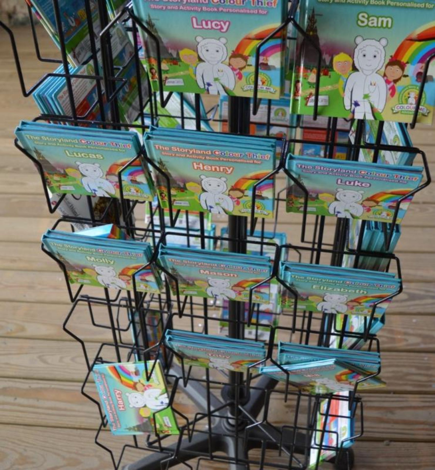 1 x Retail Carousel Display Stand With Approx 125 x Personalised Storyland Colour Thief Colouring Bo - Image 4 of 7