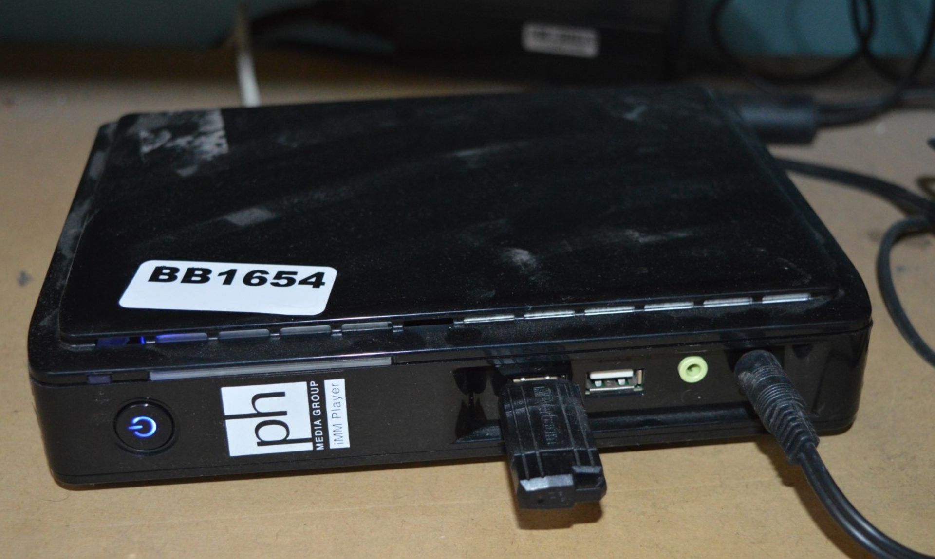 1 x Netvoyager LX1022 Thin Client Mini PC With Power Pack - Ref BB1654 FO - CL351 - Location: