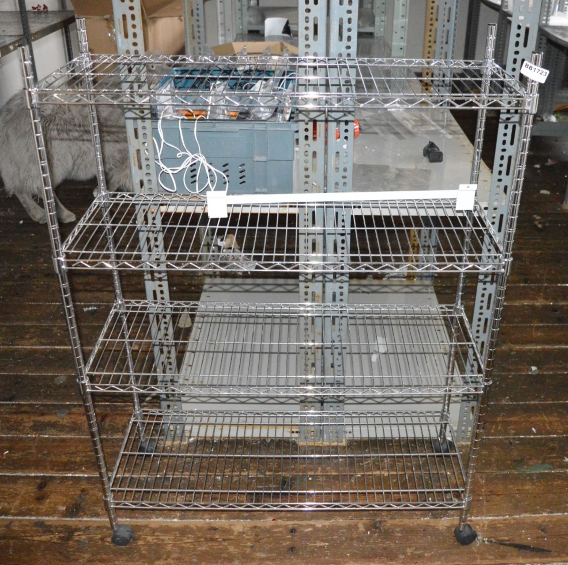 1 x Four Tier Commercial Kitchen Wire Shelving Rack With Castor Wheels - H114 x W90 x D35 cms - Used