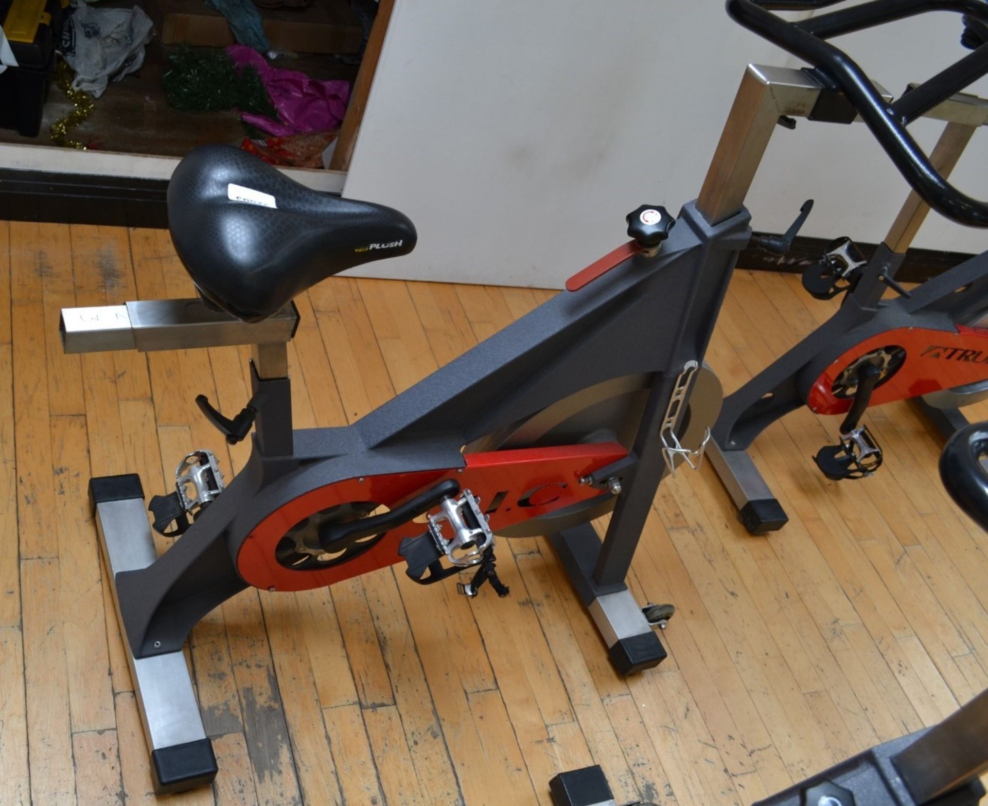 1 x TRUE Indoor Cycling Spin Bike With Adjustable Bars and Seat - Dimensions: L100cm x H100cm