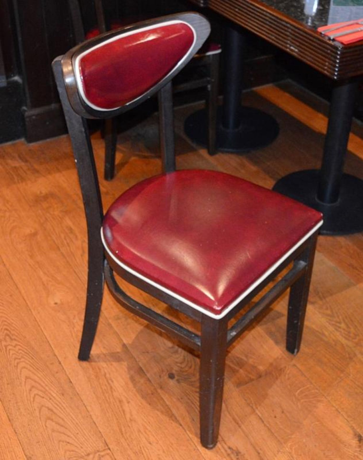 4 x American Diner Restaurant Chairs - Each Features Red Faux Leather Upholstery And White Piping -
