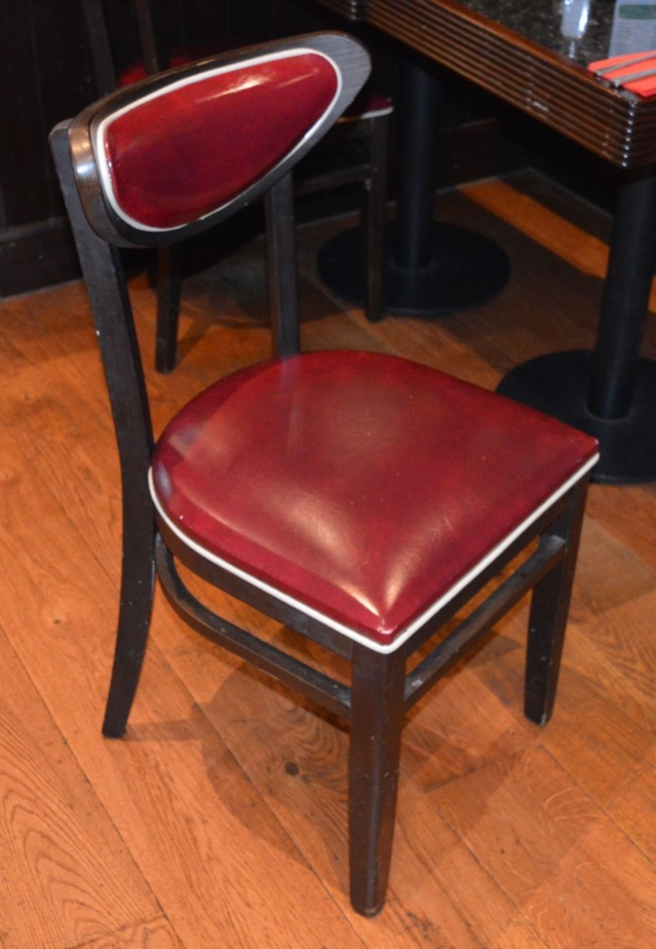 8 x American Diner Restaurant Chairs - Each Features Red Faux Leather Upholstery And White