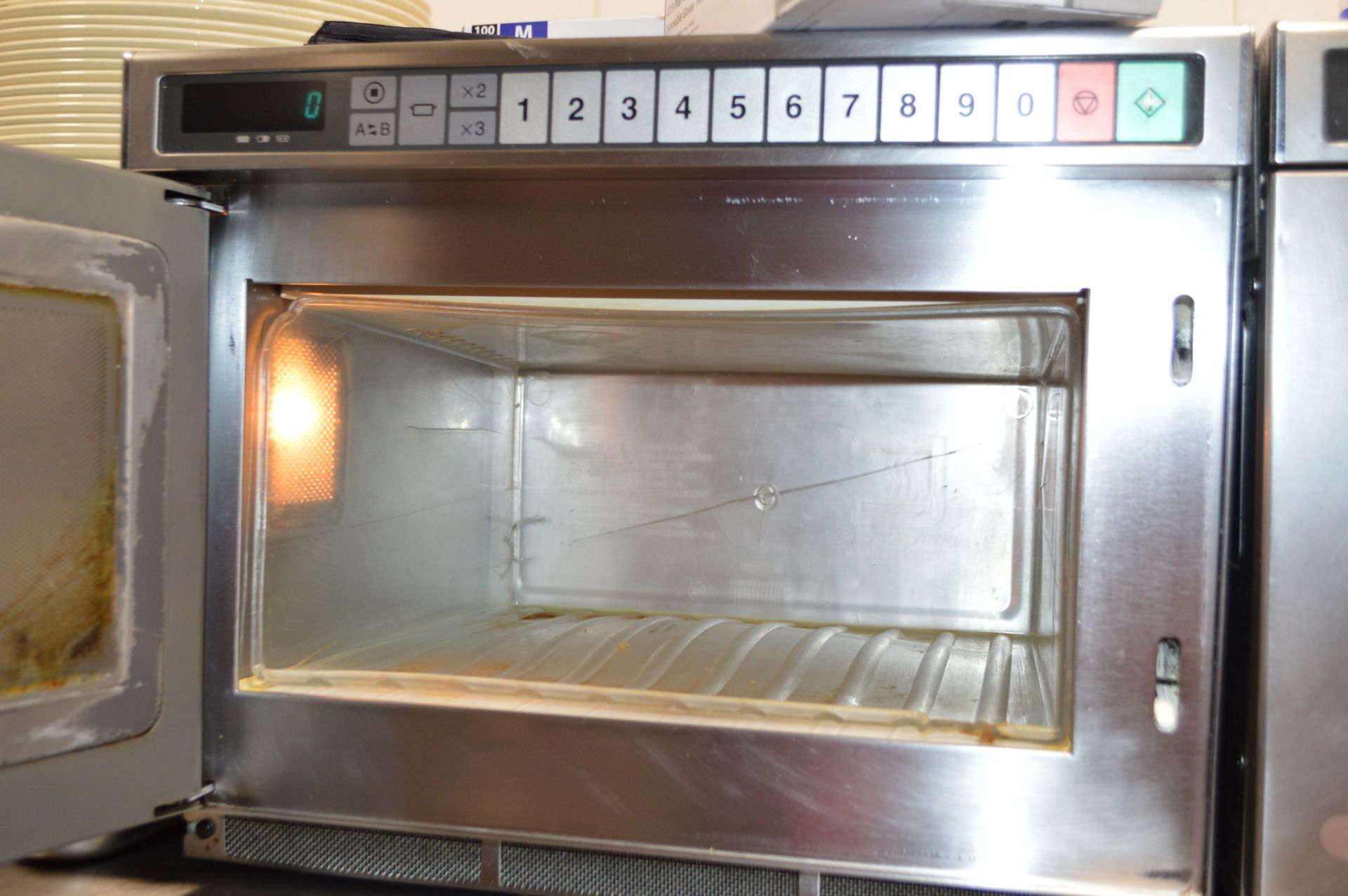 1 x Panasonic Commercial Microwave Oven With Stainless Steel Exterior and Wall Mounted Shelf - Ref - Image 2 of 2