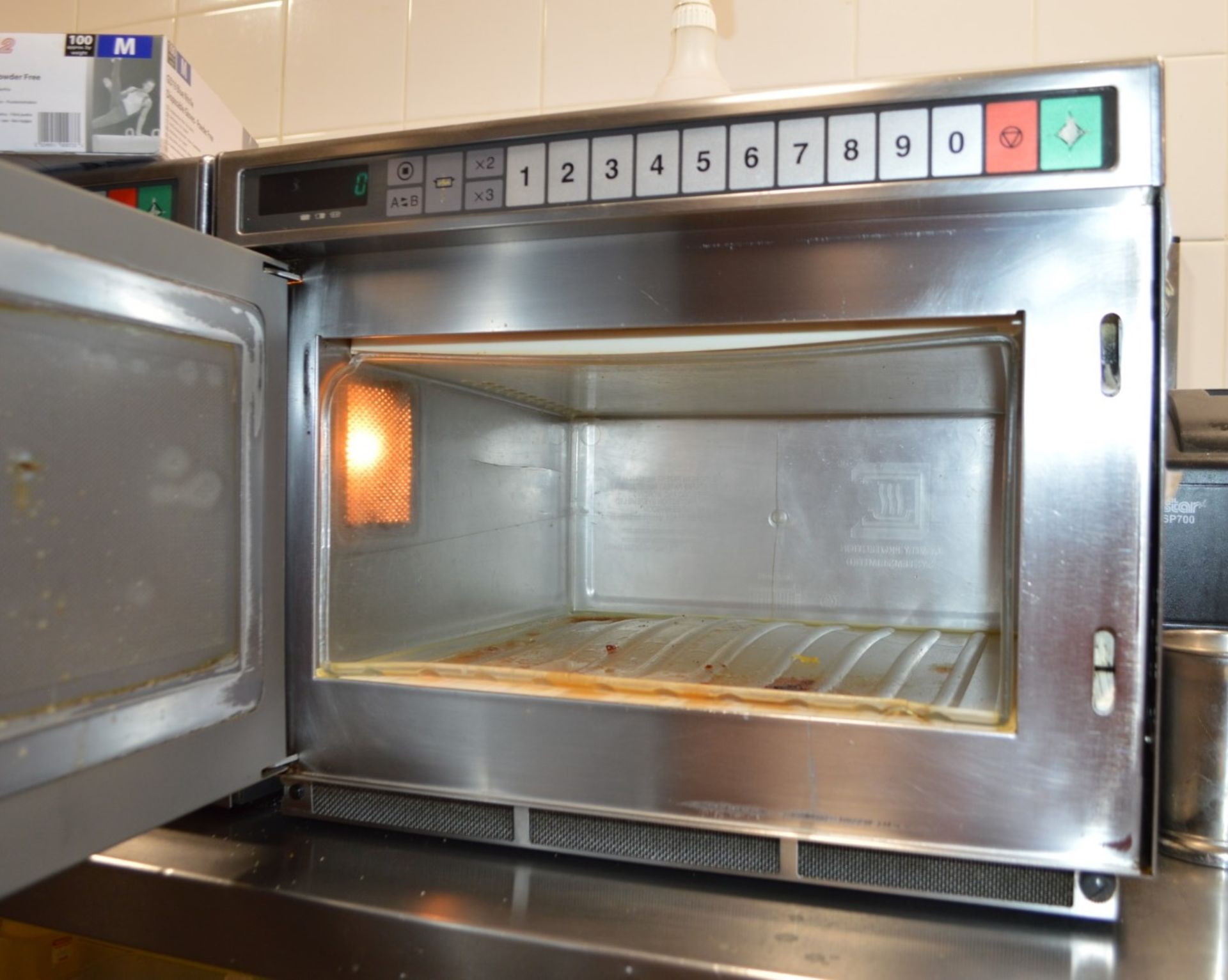 1 x Panasonic Commercial Microwave Oven With Stainless Steel Exterior and Wall Mounted Shelf - Ref - Image 2 of 2