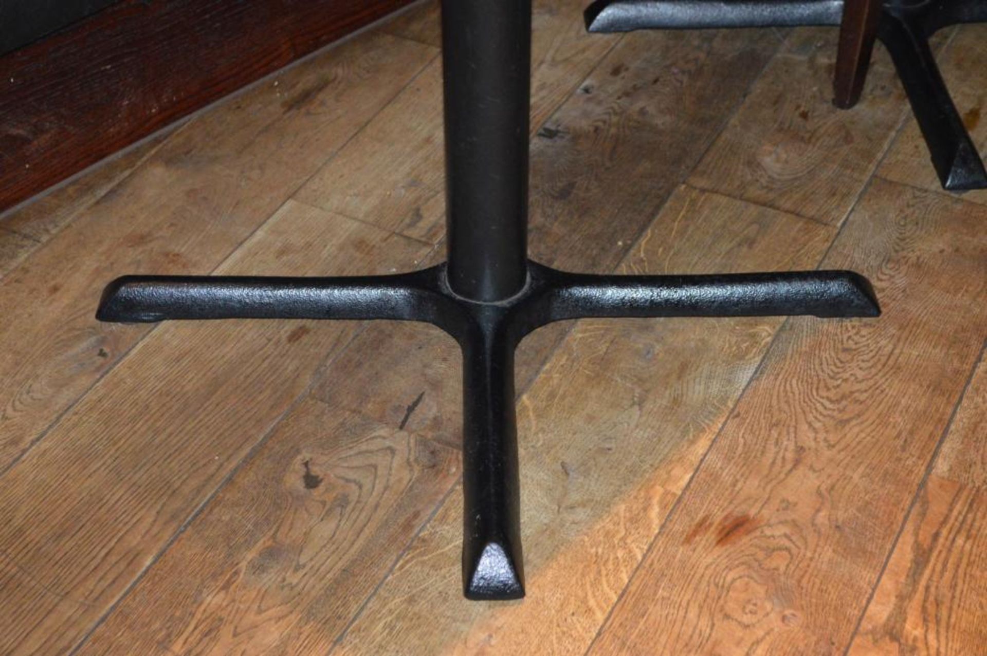 1 x Restaurant Dining Table With Cast Iron Base - Two Tone Wooden Finish With Shaped Edges - H76 x - Image 2 of 5