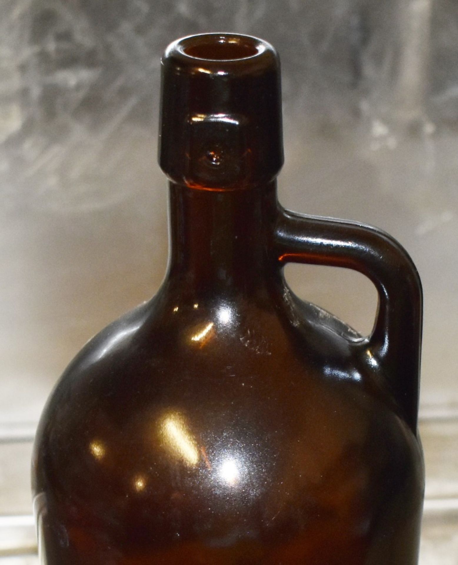 200 x Brown Glass Beer Bottles With Handle - 100cl 75mm - Height 25cms x Diameter 10cms - New and - Image 2 of 4