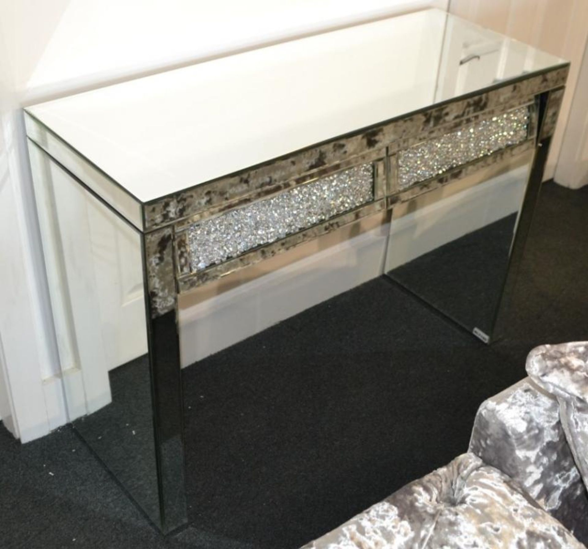 1 x Double Draw Mirrored Dressing Table. A beautiful mirrored dressing table with crystal encrusted