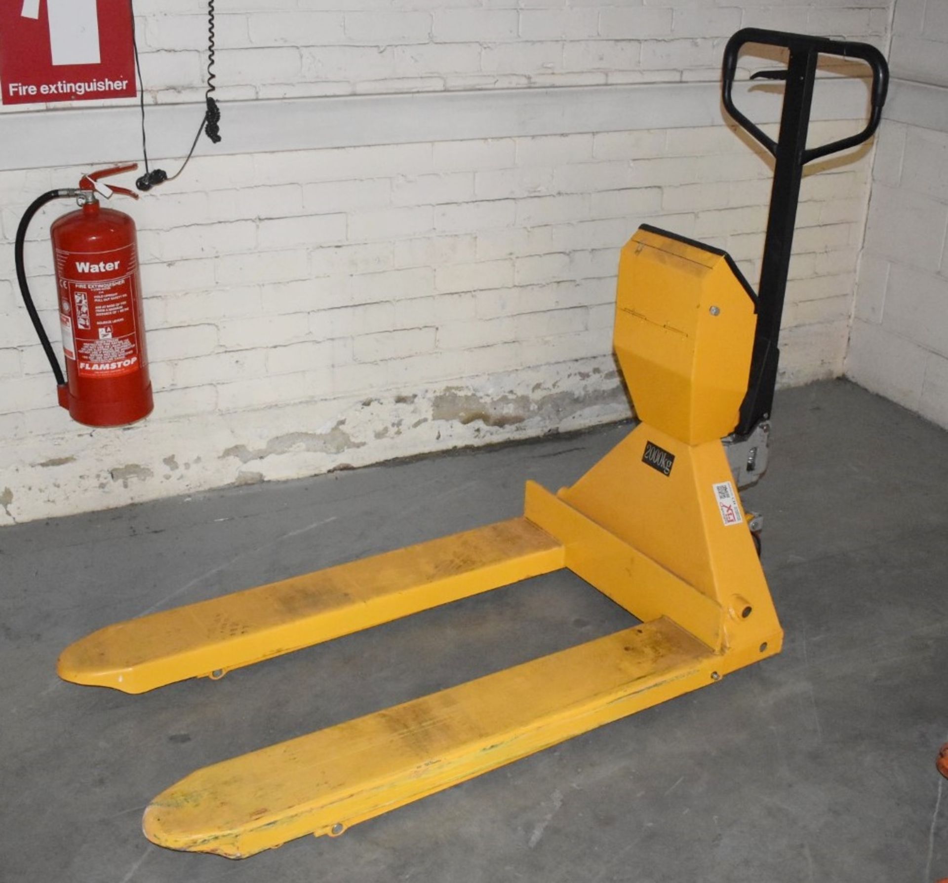 1 x Hand Pump Truck With 2000kg Electirc Capacity Lift - Fork Length 113 x Width 70 cms - Ref