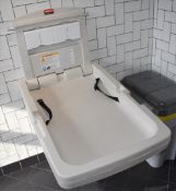 1 x Wall Mounted Rubbermaid Baby Changer Unit - CL499 - Location: London EN1