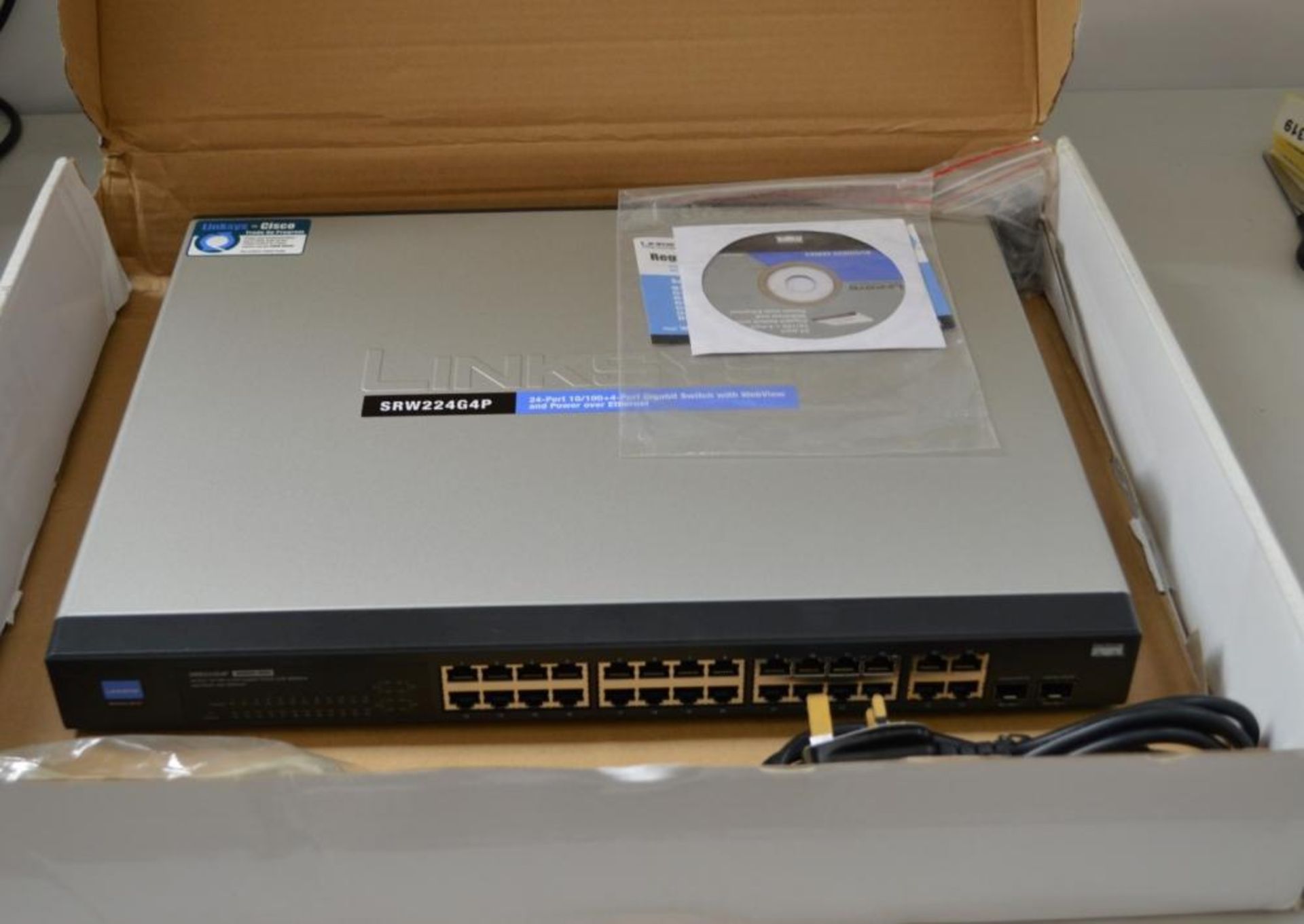 1 x Cisco SRW224G4P 24-port Switch - Ref HK212 - CL394 - Location: Altrincham WA14 - HKPal4