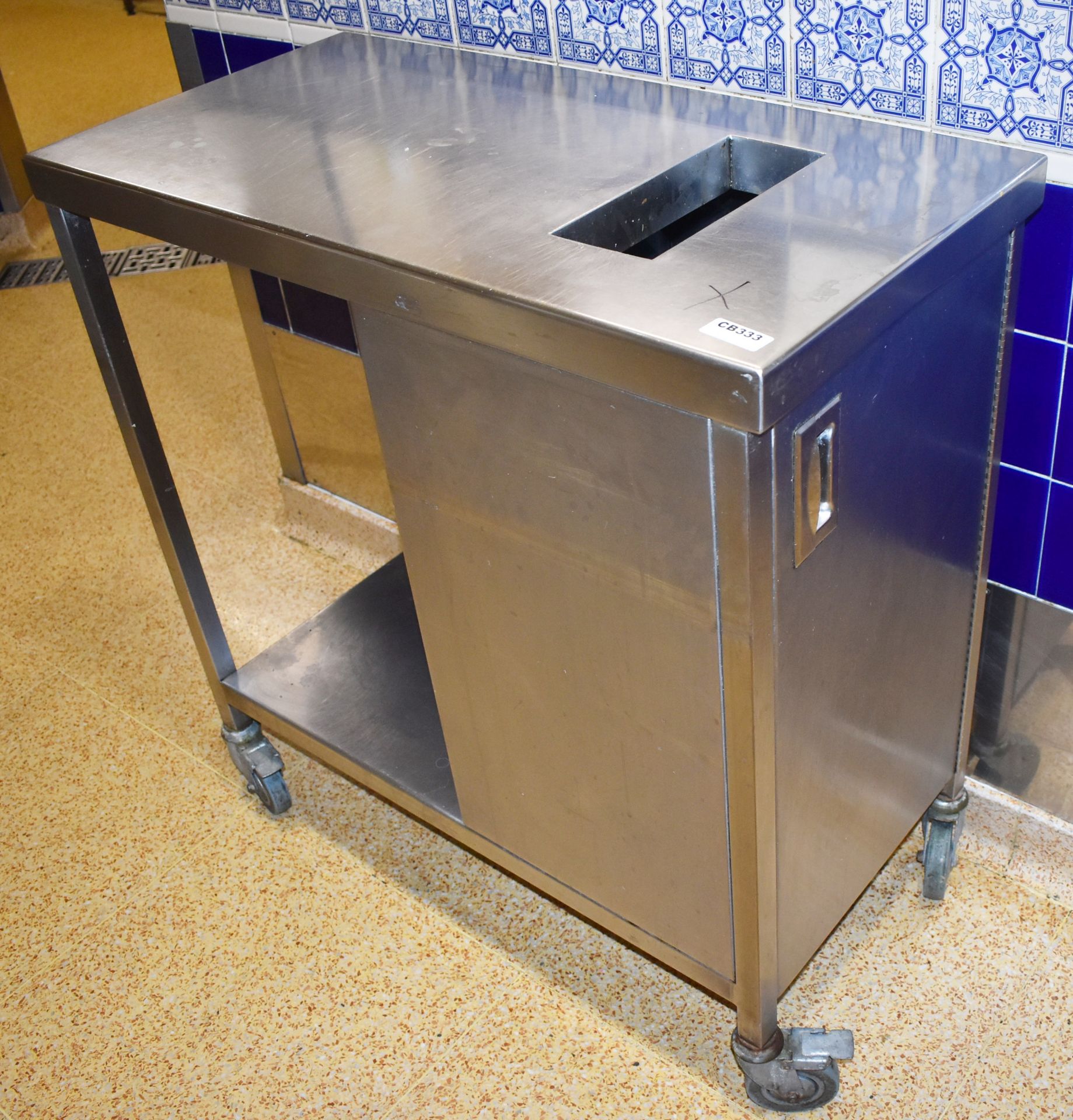 1 x Stainless Steel Prep Bench With Wast Bin Chute, Waste Bin, Waste Bin Storage Cupboard and Castor