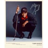 WOODS TIGER: (1975- ) American Golfer, Open Champion 2000, 2005 & 2006 and U.S.