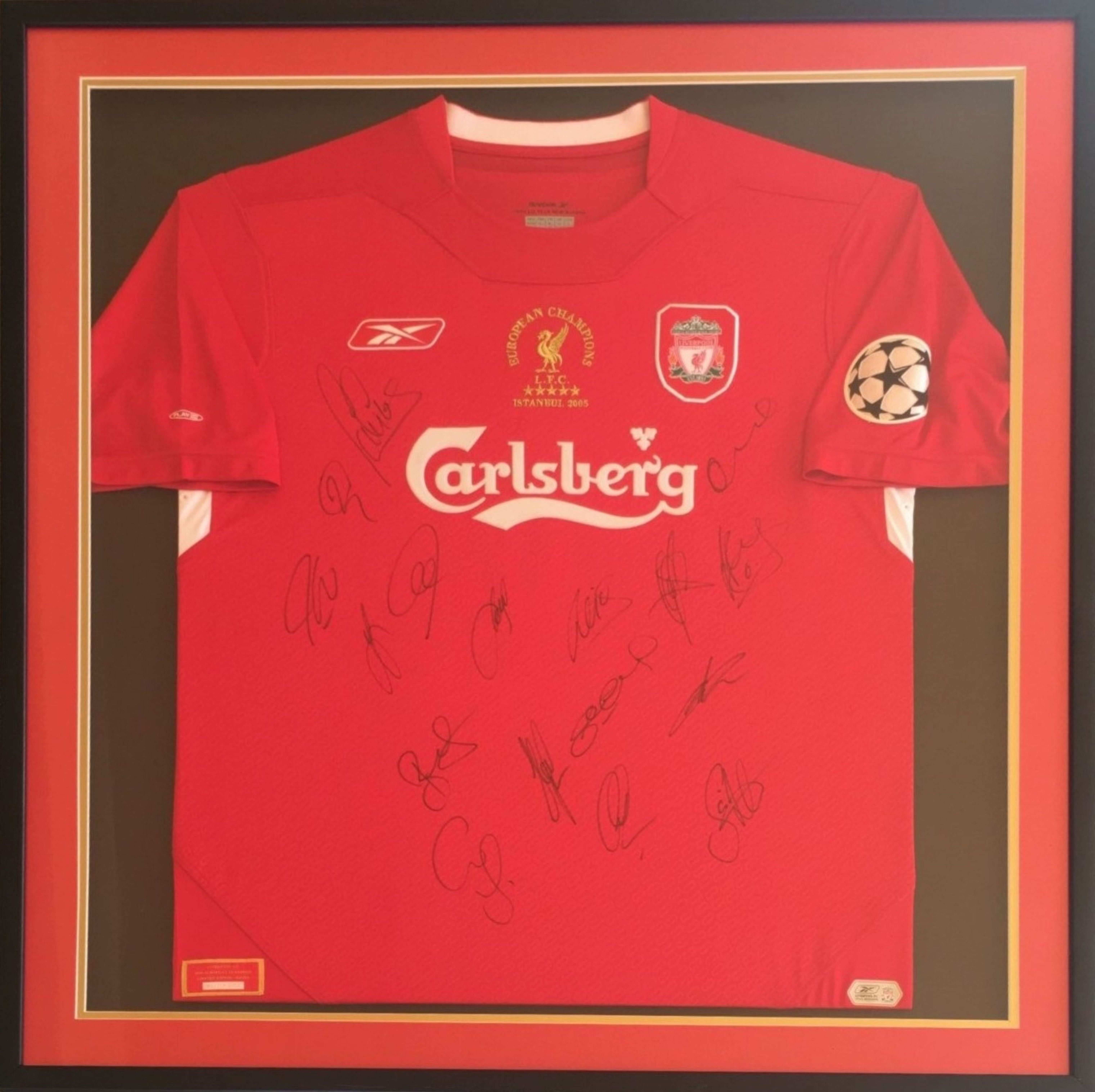 LIVERPOOL FC CHAMPIONS LEAGUE 2005: An excellent multiple signed squad commemorative red shirt,