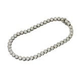 Bracciale modello Tennis a cipollina, in oro bianco 18kt gr. 14 lungh. 19 cm con diamanti round