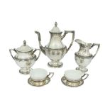 Servizio da the in argento tit. 800 con 12 tazze in ceramica con teiera, zuccheriera, lattiera gr.