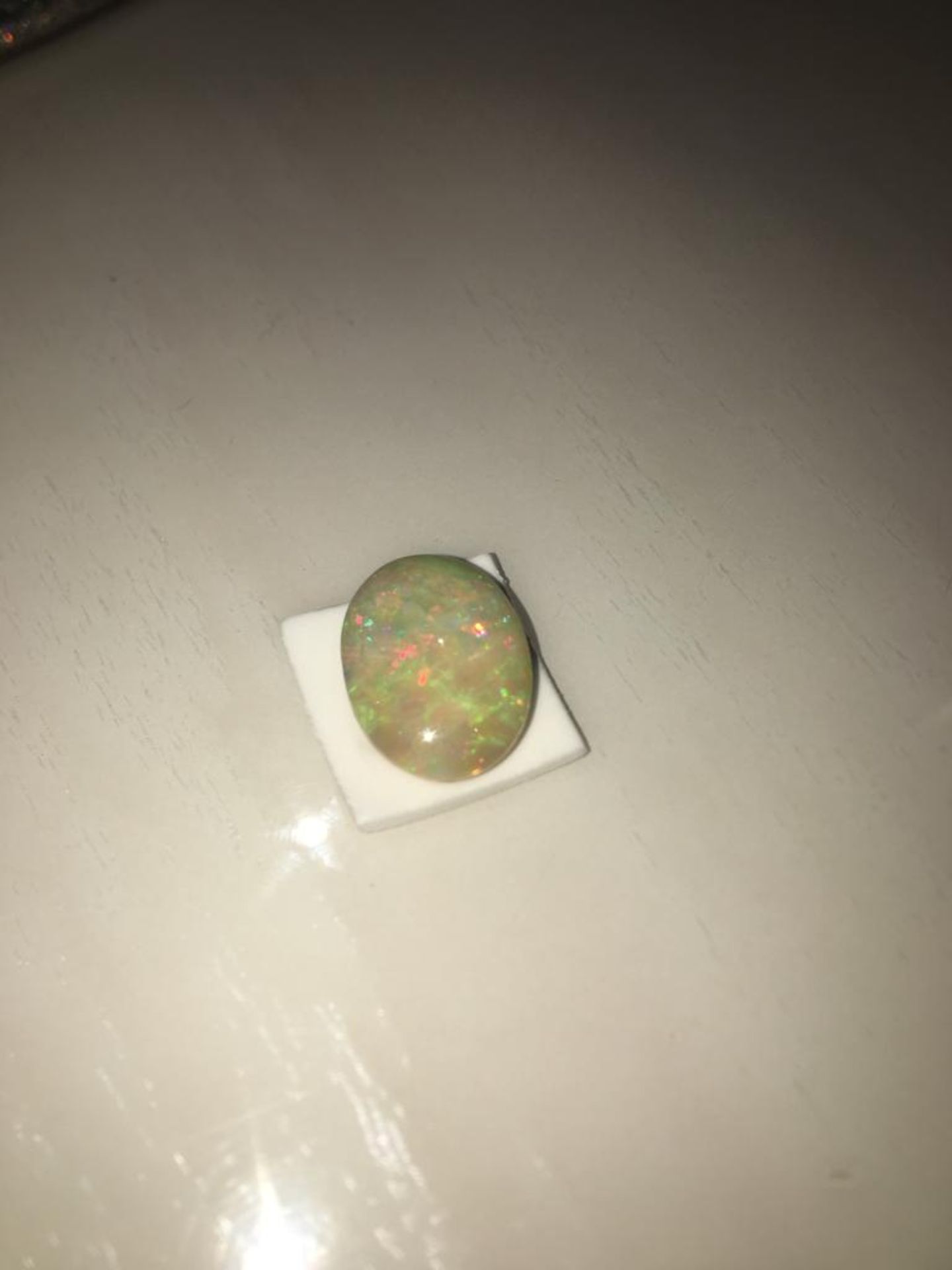 22.32 CARATS NATURAL OPAL UN HEATED WITH PGTL GEMSTONE REPORT - Image 2 of 2