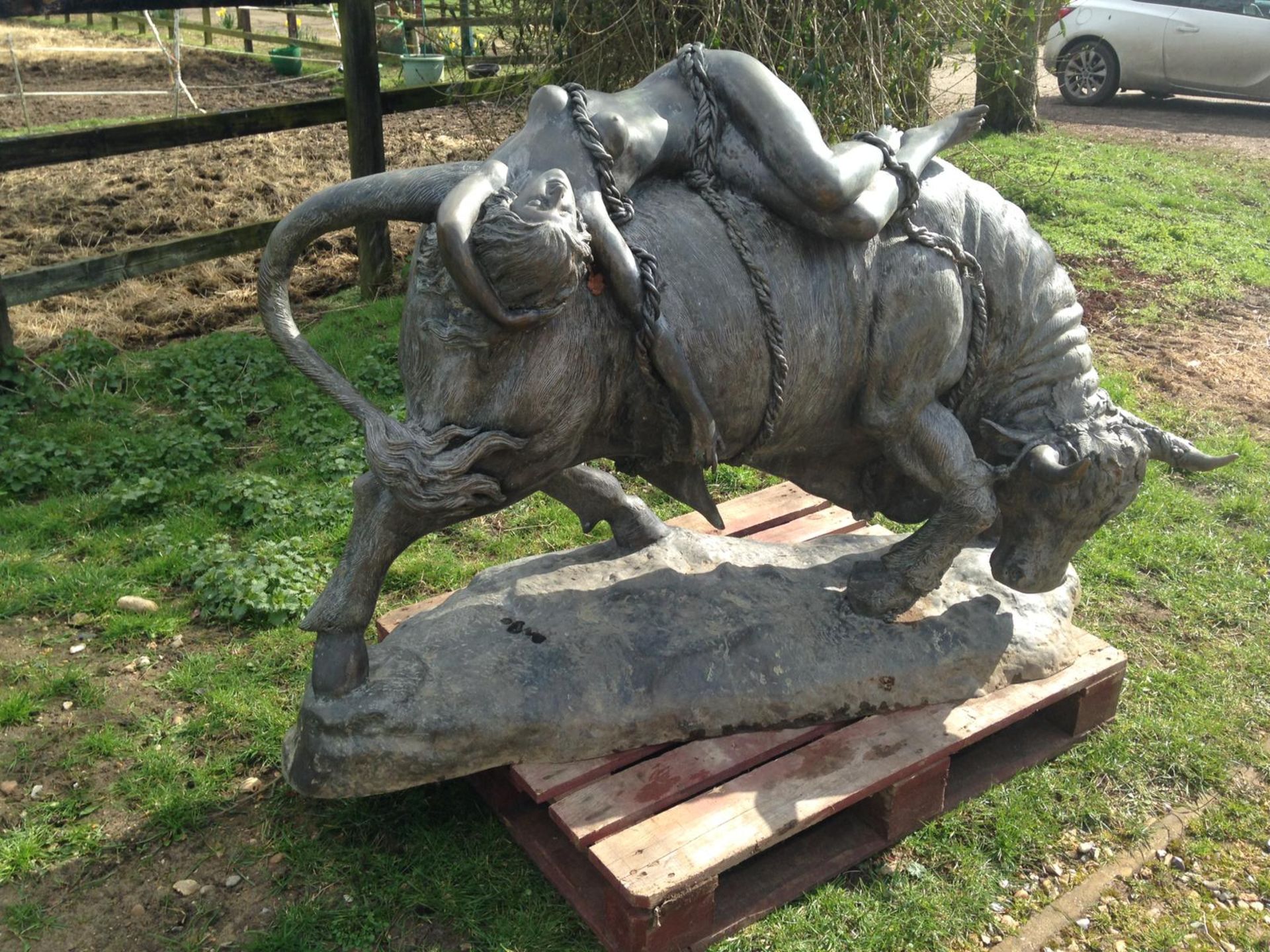 CAST IRON BULL WITH LADY LYING ON TOP SCULPTURE ORNAMENT