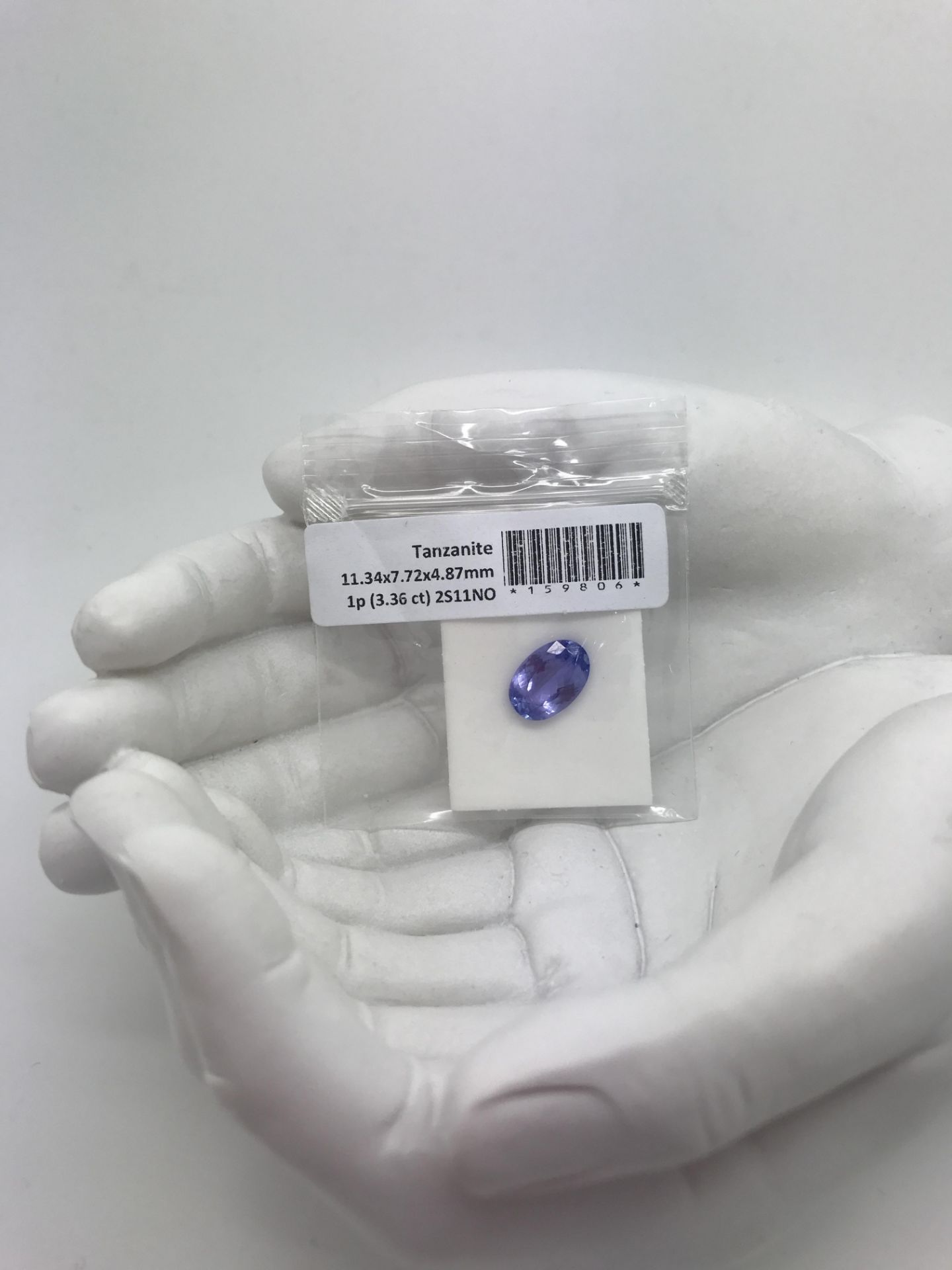 3.36CT NATURAL TANZANITE PGTL CERTIFICATE - Image 2 of 3