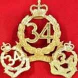 1953 - 60 era set of Australian 34th Bn (Illawara Regiment) cap & collar badge pair