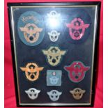 Framed set of WW2 German Police insignia & badges (11)