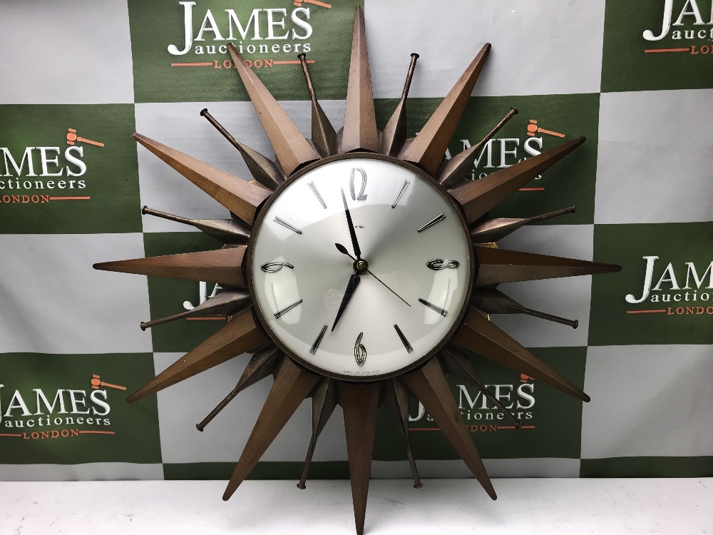 Sunburst Mid Century Modern Art Deco Clock by Metamec