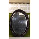 Large Oval Victorian Ebonised Pie Crust Frame Wall Mirror
