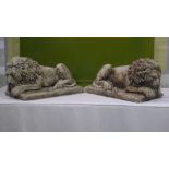 Pair of Cast Stone Recumbent Lion Figures